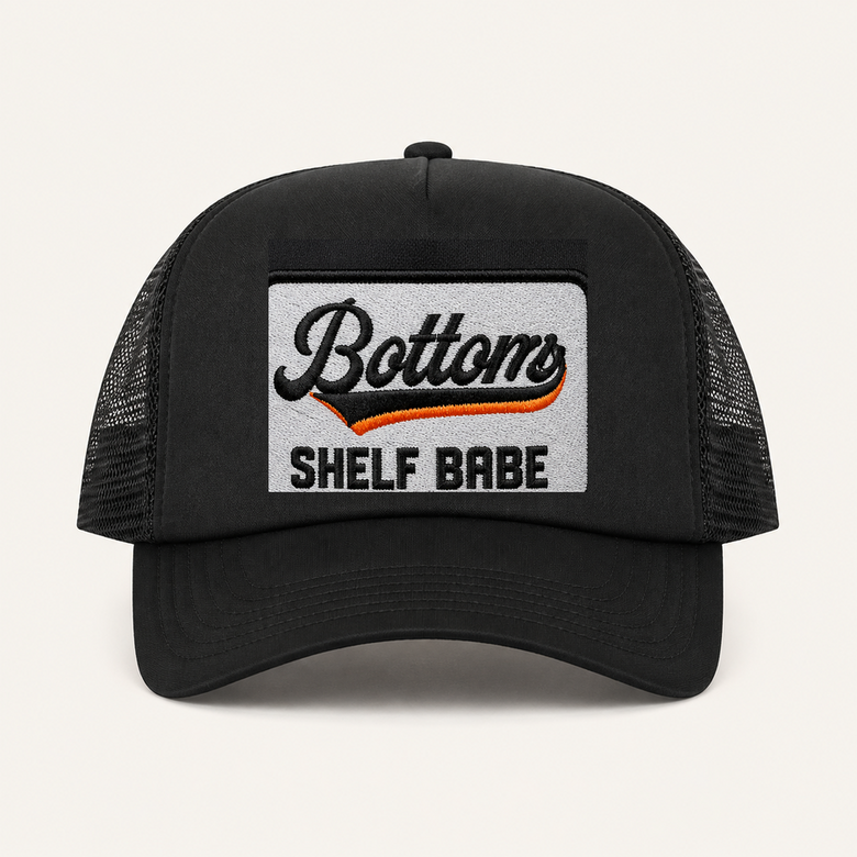 Black BOTTOMS SHELF BABE trucker hat front view