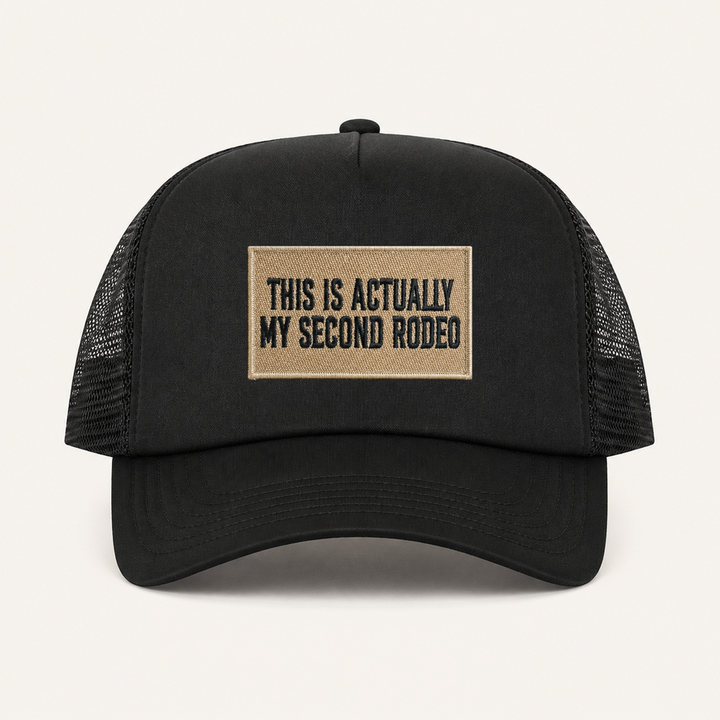 Black THIS IS ACTUALLY MY SECOND RODEO trucker hat front view
